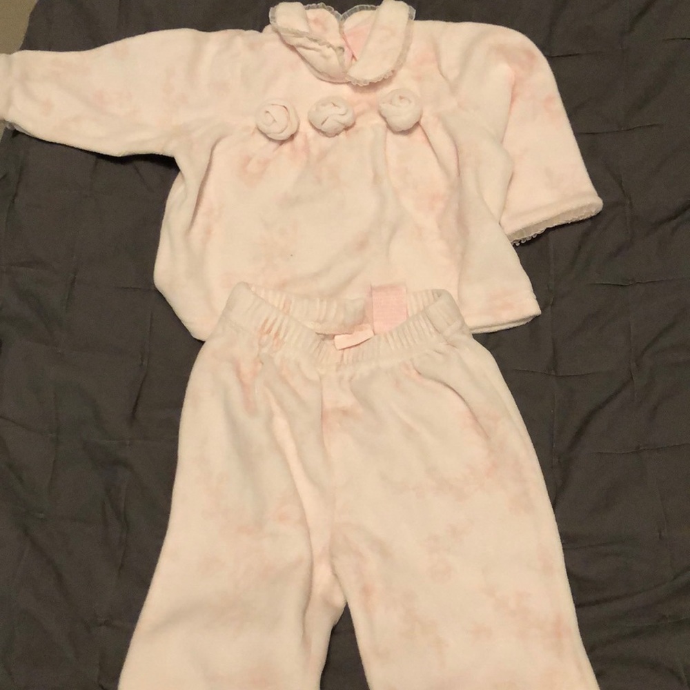 Velour pink floral outfit.